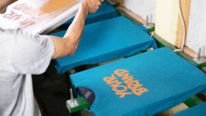 Solución de problemas de ghosting da tinta plastisol na produción de alta velocidade